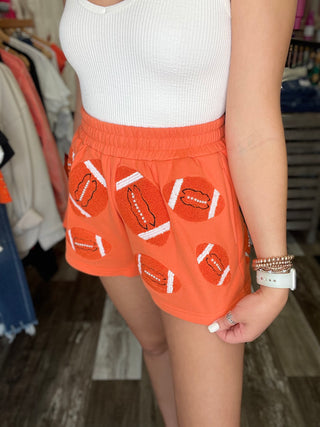 Orange Fuzzy Football Shorts Queen of Sparkles