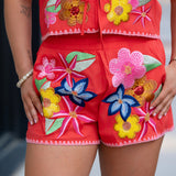 Queen of Sparkles Orange Multi Floral Sequin Shorts