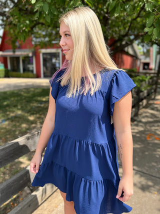 Running Out Of Road Navy Ruffle Dress